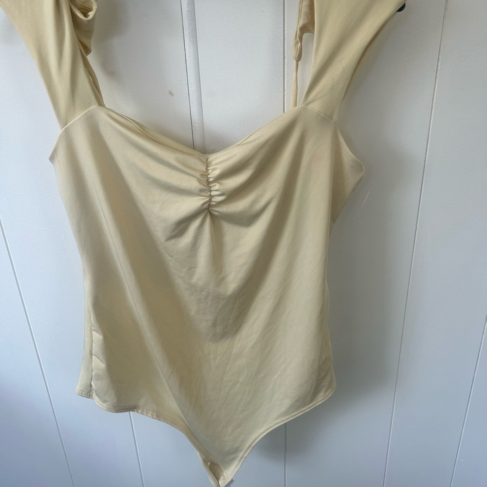 Yellow bodysuit women’s large
